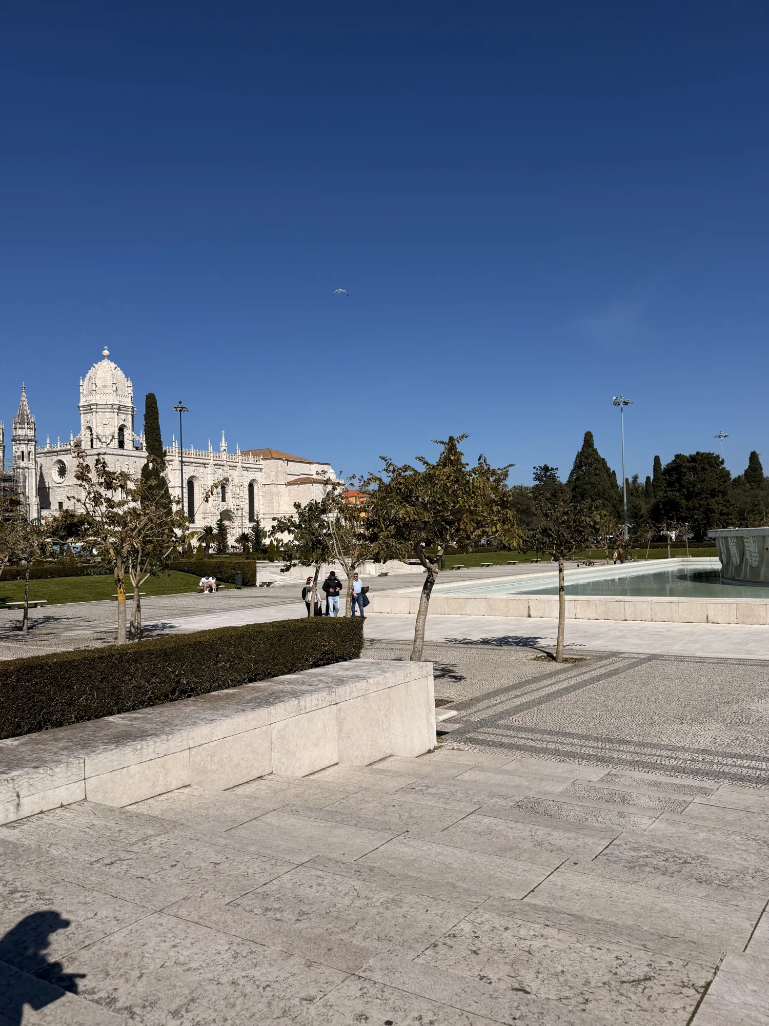 Open garden space with the monastery buildings of Belém behind