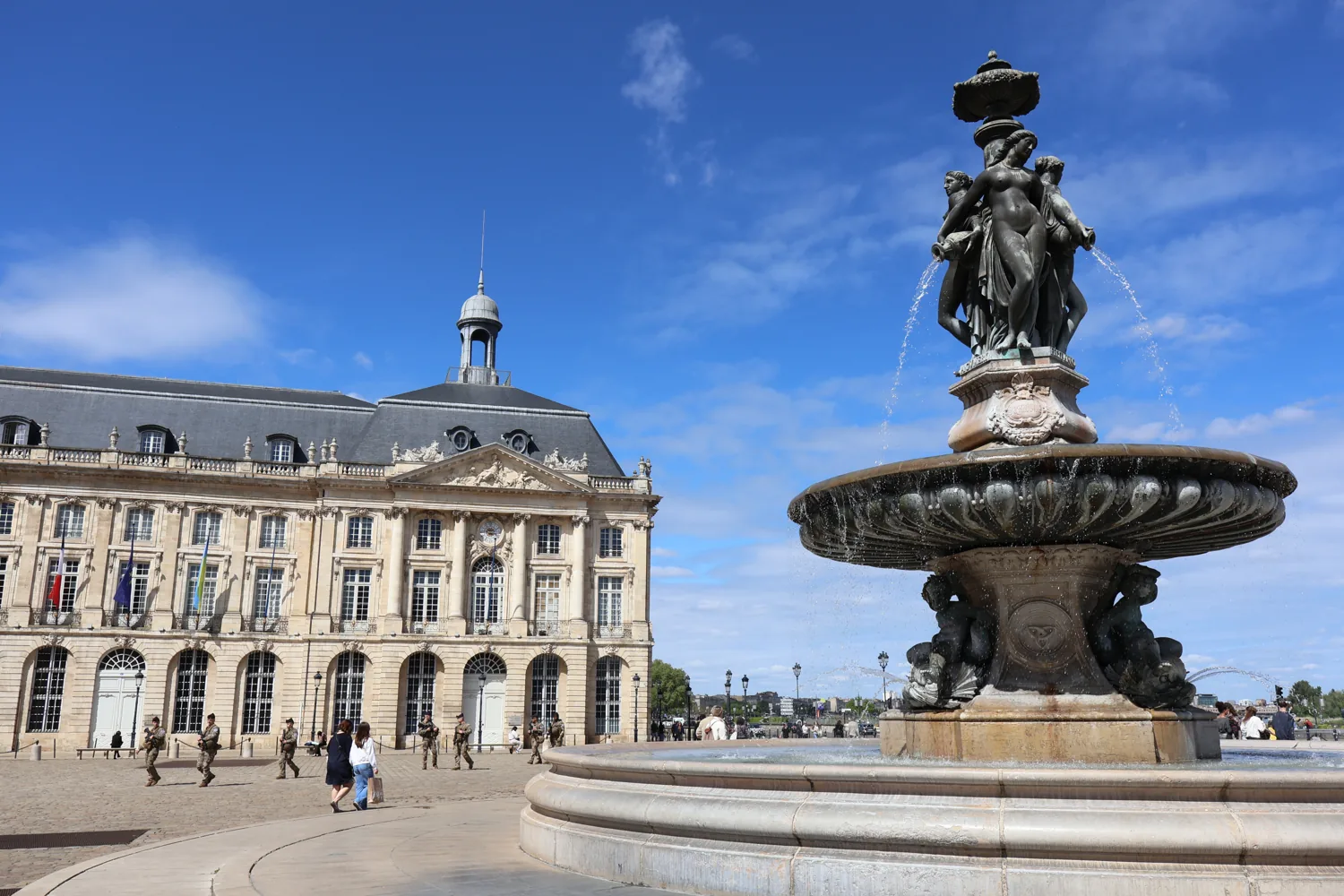 Place de la Bourse facade behind the fountain in Bordeaux